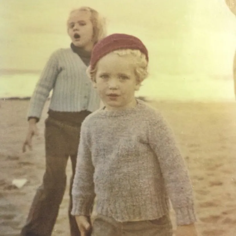 Caryn and Andre van Wyk as children on the beach